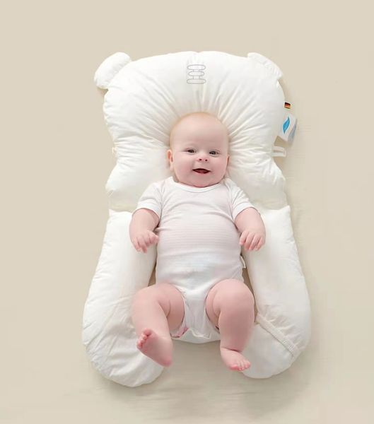 Adjustable baby pillows for safe side sleeping, made of breathable cotton to prevent rollover