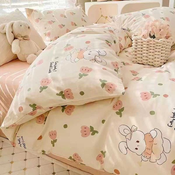 Adorable cartoon-printed kids' bedding set with soft duvet cover and flat sheet for cozy dorm or bedroom decor