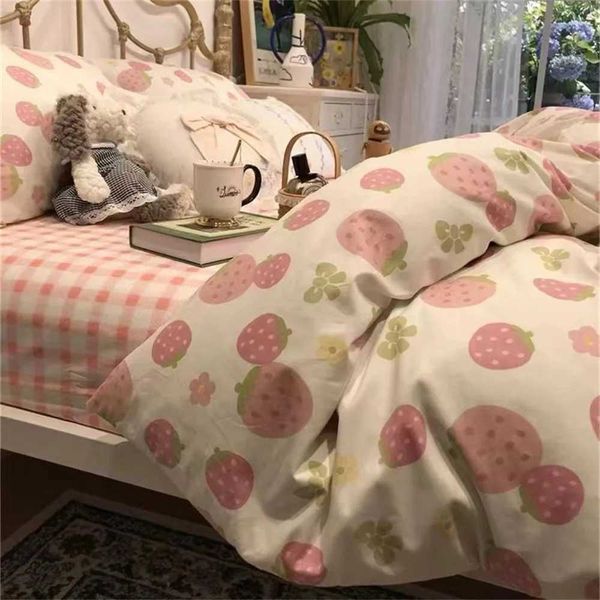 Cute pink strawberry duvet cover set with floral pillowcases for girls, available in twin and full sizes, made of soft polyester