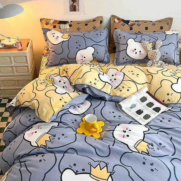 Four-piece bed sheet set with duvet cover for summer dorm use, featuring cozy brushed fabric and playful cartoon prints