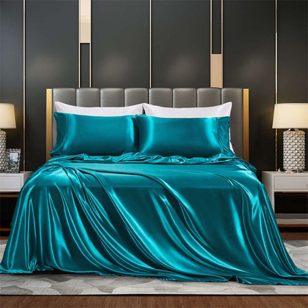 Household designer bed sets featuring satin cloth pillowcases, emulating silk, in a simple multi-color four-piece set available in four sizes