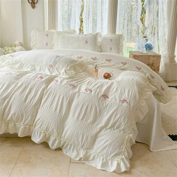 Korean-style seersucker floral embroidered four-piece bed set with lace, including flat sheet, pillowcase, and duvet cover