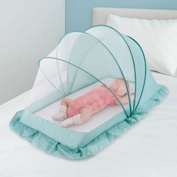 Portable folding baby crib with mosquito net, free setup included for child's bed or sleep mat