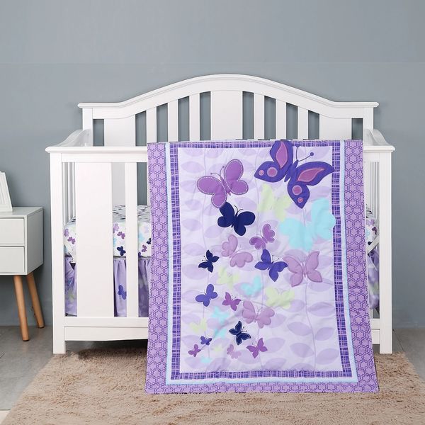 Purple cartoon-themed cotton crib bedding set for baby girls and boys, featuring a 3-piece combo with comforter, fitted sheet, and crib skirt